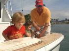 The kids showing Captain Trent how to fish! :)
