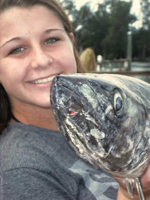 Lexus with her first big fish, 35 pound King